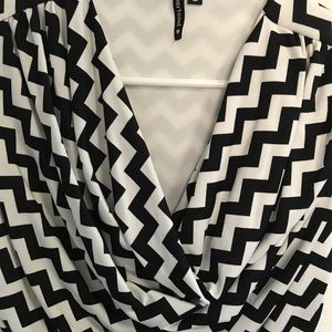 Cow neck short sleeve shirt.